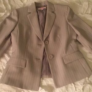 Woman’s two piece suit jacket and skirt pinstriped